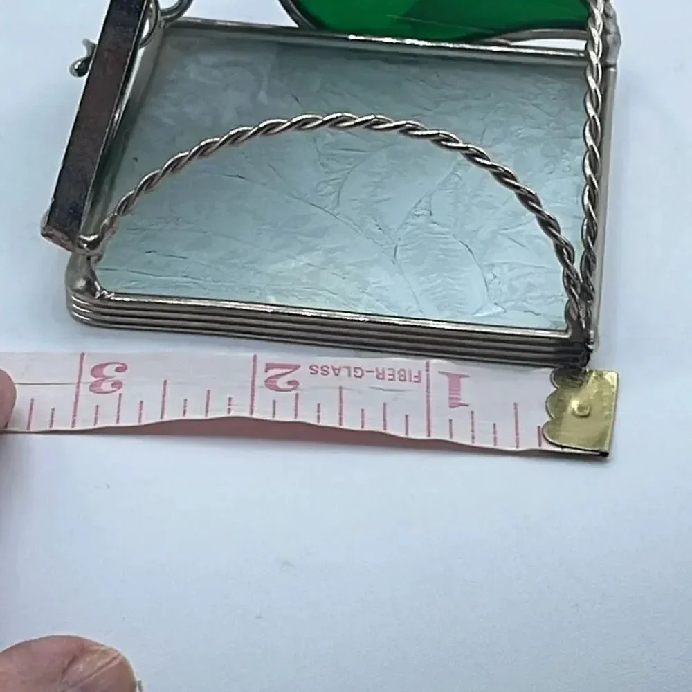 Stained glass leaded framed tea light holder.